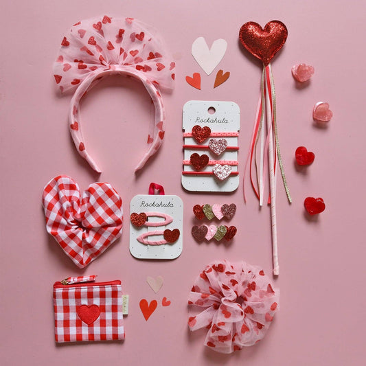 Set de patru clame de păr inimioară Rockahula Love Heart în nuanțe de roz și roșu